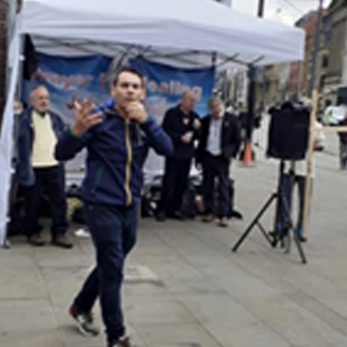 A photo of Wayne preaching in Manchester